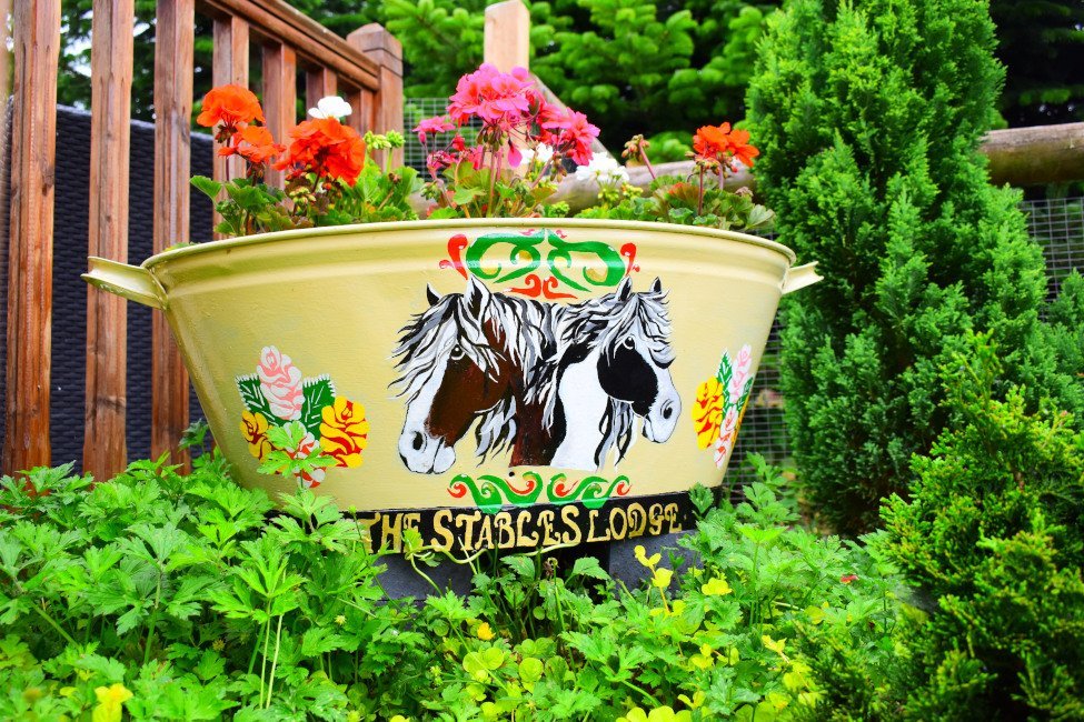 The Stables Lodge sign